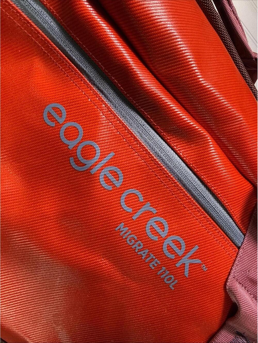 Eagle Creek Migrate 110L Tuckable Backpack Straps Wheeled Duffel Bag Red - Picture 3 of 8